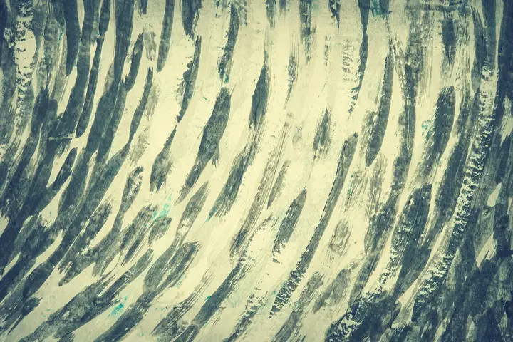 Abstract blue brushstrokes on a light background