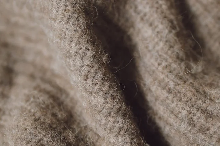 Close-up of brown wool fabric texture