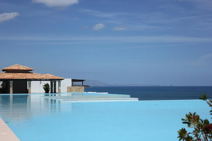 How Do I Remove Algae, Calcium, and Rust Stains from My Pool Liner and Tiles?