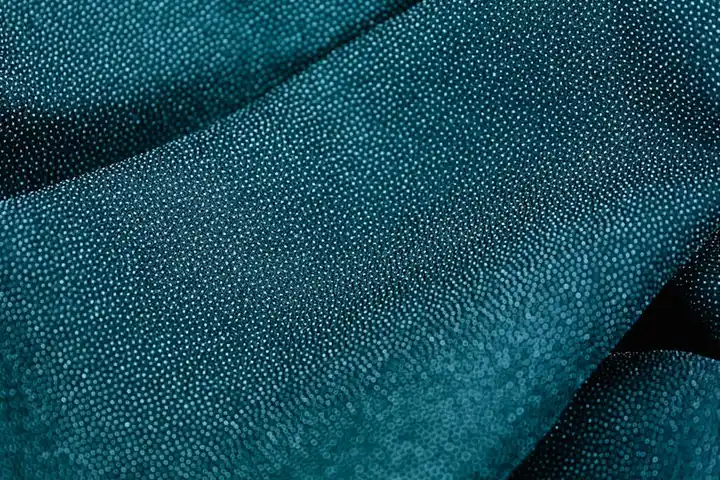 Close-up of blue textured upholstery fabric